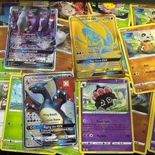 pokemon Juego de Cartas Coleccionables Pokémon, Versión en Inglés, Sol y Luna, Invasión Carmesí, 360 piezas/Caja, 10 piezas/Paquete, Batalla de Mesa para Adultos, Cartas Coleccionables, Colección de Cartas Raras, Regalo para Fiesta de Vacaciones, Regalo de Cumpleaños, Regalo de Navidad, Regalo para Amigos - Multicolor - Ver 2