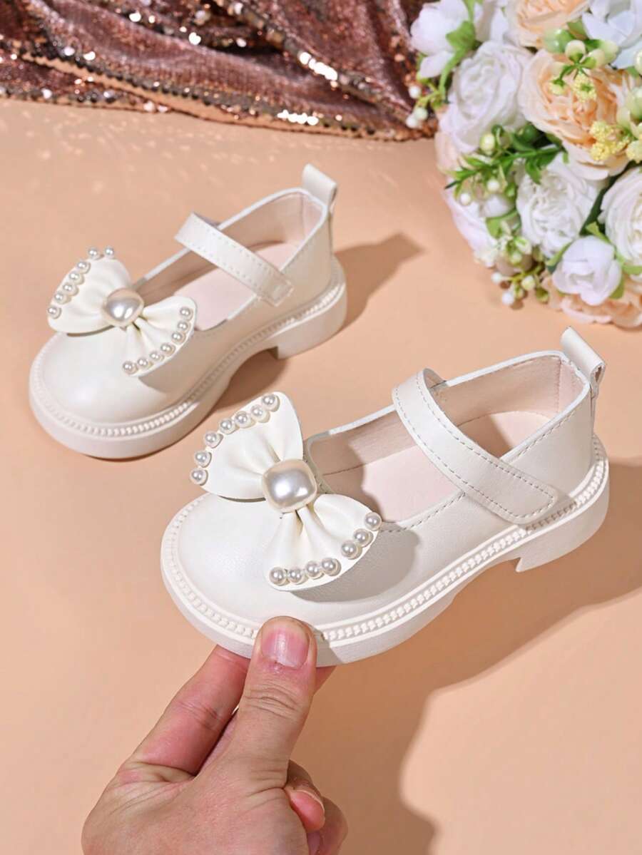 Giày búp bê Mary Jane thanh lịch cho bé gái với nơ ngọc trai - Khóa điều chỉnh, chất liệu giả da bền chắc, giày thời trang dự tiệc và đi hàng ngày cho trẻ em. - trắng - Xem 1