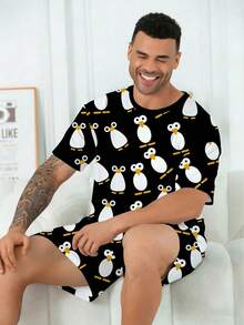 Conjunto de pijama para hombres talla grande | Parte superior de cuello redondo y manga corta, y pantalón corto casual con cintura elástica, conjunto de 2 piezas | Tela de punto de poliéster suave y transpirable, corte holgado | Diseño casual con estampado de pingüinos de ojos grandes - Negro - Ver 5