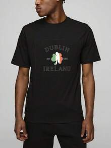 Men's T-Shirt, Women's T-Shirt,  St Patrick's Day Themed Designs Featuring,  Dublin Ireland Text With Shamrock Design In Green White And Orange Colors Centered On Black T Shirt Background Featuring Classic Typography And National Symbolism Representing Irish Heritage And Culture Comfortable And Versatile Outdoor Casual Short Sleeve - Negro - Ver 4