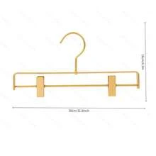 4个可调节铝合金裤/裙衣架，无缝衣柜收纳架，多功能衣橱整理架，适用于裤子、裙子和配饰，节省空间，轻便耐用，防锈，防滑夹子，方便取用衣物，非常适合小卧室和宿舍，是换季整理衣橱的理想之选，保持衣物整齐可见，最大限度地利用悬挂空间，坚固耐用，外观时尚。 - 金色 - 查看 3