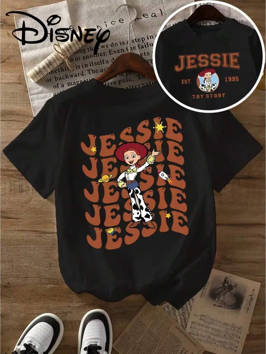 The Green T-Shirt Is Printed With The Repeated Pattern Of Jessie Jessie, The Character Of Toy Story, And Her Name. Disney's New Short-Sleeved T-Shirt Tops In Summer Are Ladies' Casual Fashion, Printed T-Shirts And Elegant Women's Dresses. - Black - View 1