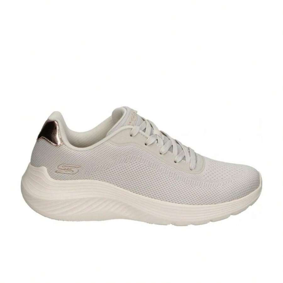 Skechers W Bobs Squad Waves TPE Sneaker For Women In Brown, A Low-Platform Shoe Designed To Combine Style And Comfort. Made With Textile Material And Synthetic Sole For Superior Grip, They Include Memory Foam Padding For Exceptional Comfort. Vegan And Washing Machine , With Elastic Laces For A Perfect Fit. Add A Chic Touch To Your Casual Look With These Sneakers. - 米色 - 查看 1