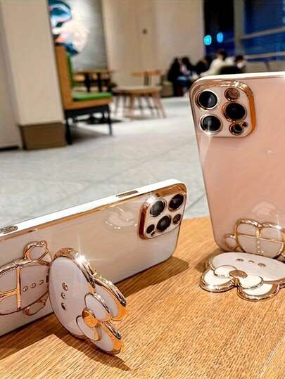 Nuevo soporte de teléfono con espejo de maquillaje con tema de conejo de dibujos animados. Adecuado para varios modelos de teléfonos. Soporte de escritorio, soporte hueco, espejo de maquillaje de conejo, con pegatina de respaldo, plegable y giratorio, accesorio de funda de teléfono de conejo de dibujos animados lindo