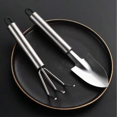 OBOVAY Bộ 2 dụng cụ làm vườn mini bằng thép không gỉ ngoài trời, xẻng làm vườn gia đình có tay cầm - Xẻng và cào kim loại bền, nĩa xới đất - Lý tưởng cho việc làm vườn và trồng cây, làm tơi đất. Bộ dụng cụ xẻng cào đất gia đình, dụng cụ làm vườn có tay cầm và dụng cụ làm vườn nông thôn, bộ dụng cụ làm vườn nhỏ gọn.
