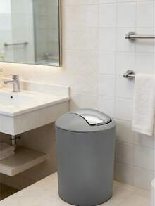 1个时尚灰色翻盖垃圾桶，无需接触即可处理垃圾，适用于家庭、办公室和公共场所。它经久耐用且易于清洁，是厨房、浴室、走廊等室内场所的理想选择。 - 彩色 - 查看 9