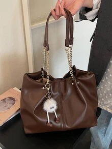 经典咖啡色女士手提包；配有可爱毛绒吊坠装饰；双金属链条肩带，现代都市通勤风格；实用大容量，适合购物和外出；精致磁扣设计；多功能可折叠；采用耐用防水PU材质；适合送礼、购物、约会、工作、摄影、度假等各种场合。 - 棕色 - 查看 3