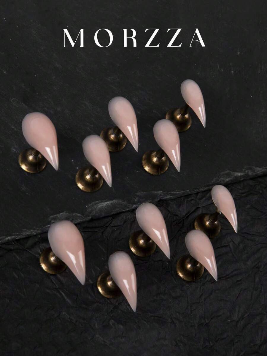 Nâng tầm diện mạo tức thì với bộ 10 móng giả ngắn hình móng mèo 25mm độc đáo, cá tính, phong cách đường phố cổ điển, đơn giản, thanh lịch, tinh tế, ngọt ngào, dễ thương, màu hồng da tự nhiên, thích hợp cho các cô gái và phụ nữ cá tính, giúp bạn thêm phần quyến rũ. - Bụi hồng - Xem 1