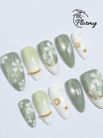 10 Handcrafted Vintage-Inspired Green Glossy Gel-Like French Manicure Nail Stickers, Almond-Shaped With Pearl Accents, White French Tips, And Hand-Painted White Flowers. Perfect For Spring And Summer Styles, Complete With Gel Polish And Buffing Strips. Ideal For All Seasons, Holidays, Daily Outings, Winter Adventures, Dates, Fashion Shows, And Romantic Occasions.