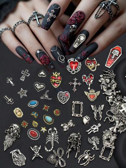 Random Assortment Of 30/20/10 PiecesVintage Gold & Silver Alloy Nail Art Decorations: Devil Heads, Demons, Ghost Flowers, Skulls, Snakes, Gun Shapes, Crosses, Spiders, Butterflies, Halloween NailCharms, 3D Bone Nail Art, Vintage Bohemian Fashion Element Nail Accessories. Personalized Nail Decorations Suitable ForNail Salons And Personal Use