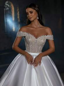 Graceful Off-The-Shoulder Backless A-Line Wedding Dress In Shimmering Satin – Luxurious Floor-Length Bridal Gown With Short Sleeve Details And Low Back, Perfect For Weddings, Christmas Festivities, Halloween Balls, Prom Events, Birthday Celebrations, And Party Nights. Designed For Nuptial Ceremonies, Evening Parties, Vacation Gatherings, Formal Occasions, Dinner Parties, Graduation Balls, Homecoming Dances, Cocktail Receptions, Bridal Party Dressing, Wedding Guest Functions, And Ceremonial Gatherings. - trắng - Xem 2