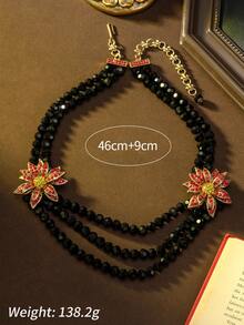 复古奢华红色花卉多层黑色水晶项链 | 宫廷复古派对的迷人之选。采用镀金合金打造，3D立体花卉设计和多层黑色水晶珠散发着冷艳奢华的气息，使其成为盛大晚宴、复古派对和婚礼等正式场合的理想之选。轻松成为复古时尚的焦点，在活动中闪耀夺目。 - 彩色 - 查看 5