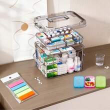 1个耐用带把手药品收纳盒，防尘防水设计，易开盖，适合居家和旅行使用。多层设计可整理急救用品和药品。透明可视层，药品收纳盒，旅行必备，小巧便携，透明设计，耐用塑料材质，药盒，多隔层设计，适合居家用户和旅行者使用。 - 灰色 - 查看 1