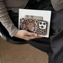 SANRIO [Saniro Phone Case] Hello Kitty Expression, Brown Leopard Print Black Leather Bow KT Cat Phone Case - Cute Bow Design, Suitable Compatible With Apple 17/17Air/17Pro/17Promax, 16/16Plus/16Pro/16Promax, 15/15Plus/15Pro/15Promax, 14/14Plus/14Pro/14Promax, 13/13Pro/13Promax, 12/12Pro/12Promax, 11/11Pro Max, Dust-Proof, High-Value, Popular Anti-Drop, 17pro, 17promax Bow - Black Leather KT - View 2