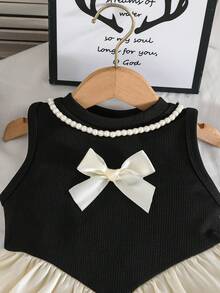 女孩简约优雅公主风套装：蝴蝶结刺绣珍珠项链装饰背心搭配薄纱拼接喇叭裤 - 黑色 - 查看 3
