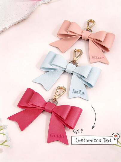 พวงกุญแจหนัง PU รูปโบว์ส่วนบุคคล, พวงกุญแจน่ารักเหมาะสำหรับกระเป๋าถือและกระเป๋าเป้, โบว์สั่งทำพิเศษ, พวงกุญแจกระเป๋า, พวงกุญแจหนัง, แบรนด์ส่วนบุคคล, ของขวัญเพื่อนเจ้าสาว, ความสวยงามน่ารัก, ของตกแต่งกระเป๋าเป้, อุปกรณ์เสริมกระเป๋าถือ, พวงกุญแจ, พวงกุญแจตัวอักษร, ของตกแต่งกระเป๋าถือหนังทำมือรูปโบว์, อุปกรณ์เสริมกระเป๋าที่หรูหรา