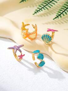 Set de 4 anillos de metal con diseños de dopamina, estrella de mar, concha y playa, adecuados para usar de vacaciones, versátiles y elegantes - Naranja - Ver 6