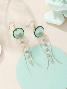 这款女士夏季海滩风水母耳环，采用几何流苏和轻盈吊坠设计，搭配闪亮水母吊坠，散发迷人的海滩度假气息。非常适合女士泳池派对、夏季郊游和日常佩戴，是送给她的完美礼物。 - 淺藍色 - 查看 4