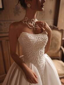 Elegant Strapless A-Line Wedding Dress With Chic Open Back In Satin – Sophisticated Floor-Length Bridal Gown Featuring A Flattering Corset-Style Bustier, Daring Rear Cutout, And Lustrous Satin Silhouette, Perfect For Weddings, Christmas Galas, Halloween Balls, Formal Dances, Birthday Celebrations, And Special Evening Events. A Versatile Choice For Wedding Receptions, Holiday Parties, Anniversary Dinners, Luxury Getaways, Black-Tie Occasions, Cocktail Gatherings, Bridal Showers, Wedding Guest Attire, Graduation Formals, Homecoming Events, And As A Modern Bridesmaid Or Festive Evening Gown. - 白色 - 查看 2