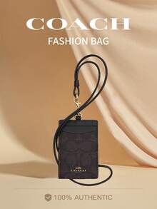 Coach Portaidentificación de cuero con ventana transparente para identificación, ranuras para tarjetas de crédito y correa para el cuello desmontable - Color nogal y negro - Ver 1