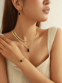 Ensemble de bijoux 4 pièces élégant et à la mode en acier inoxydable plaqué or avec pendentif rectangulaire en zircone verte, collier, bracelet et boucles d'oreilles, convient pour le port quotidien des femmes, les fêtes, les mariages, la fête des enseignants et autres occasions, cadeau de bijoux à la mode - or noir - Voir 3