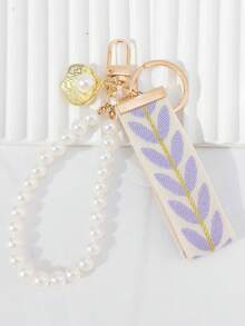 A Fashionable Keychain Adorned With Purple Woven Tape And Imitation Pearls - Mauve Purple - View 1