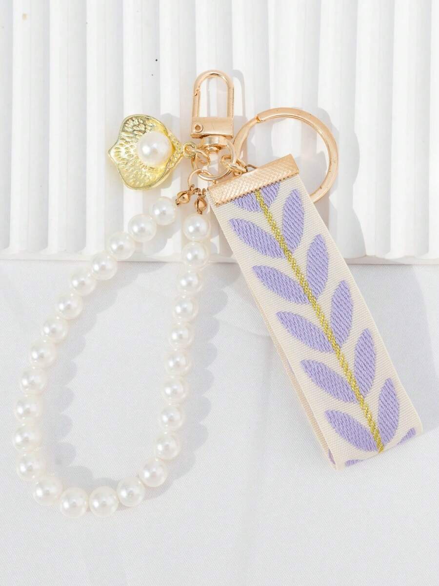 A Fashionable Keychain Adorned With Purple Woven Tape And Imitation Pearls - Mauve Purple - View 1