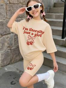 2pcs Girls Casual Outfit, Loose Cherry Bow Print T-Shirt With "I'm Just A Girl" Slogan, Paired With Cherry Decor Bike Shorts Set, Suitable For Back To School, Hangout With Friends, Daily Casual Wear, Summer - Apricot - View 7