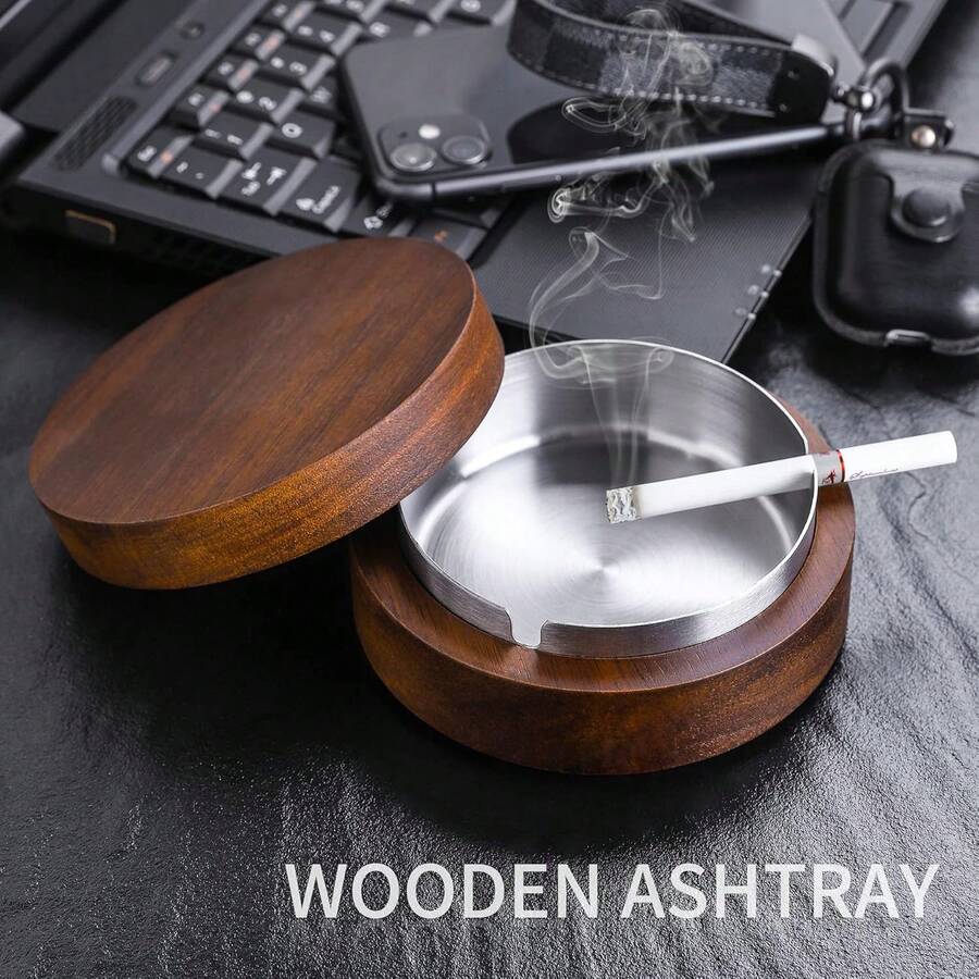 This Solid Wooden Ashtray Is Suitable For Use In Homes, Living Rooms, Dining Rooms, Bars, And Offices. It Comes With A Sealed Dust-Proof Lid That Effectively Prevents Ash From Flying Around, Keeping It Clean And Tidy. Its Circular And Minimalist Design Features A Leak-Proof Ash Prevention Mechanism. - Round - View 1