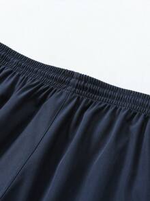 Quần short cargo nam kiểu dáng tối giản, quần ống đứng dài đến đầu gối có dây rút. - Màu xanh hải quân - Xem 7