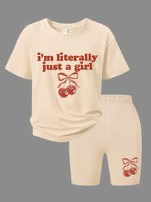 2pcs Girls Casual Outfit, Loose Cherry Bow Print T-Shirt With "I'm Just A Girl" Slogan, Paired With Cherry Decor Bike Shorts Set, Suitable For Back To School, Hangout With Friends, Daily Casual Wear, Summer - Apricot - View 2