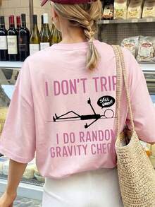 一件女士夏季圆领短袖T恤，印有“我没绊倒，我只是在做随机重力测试”和积极态度英文图案。 - 粉色 - 查看 6