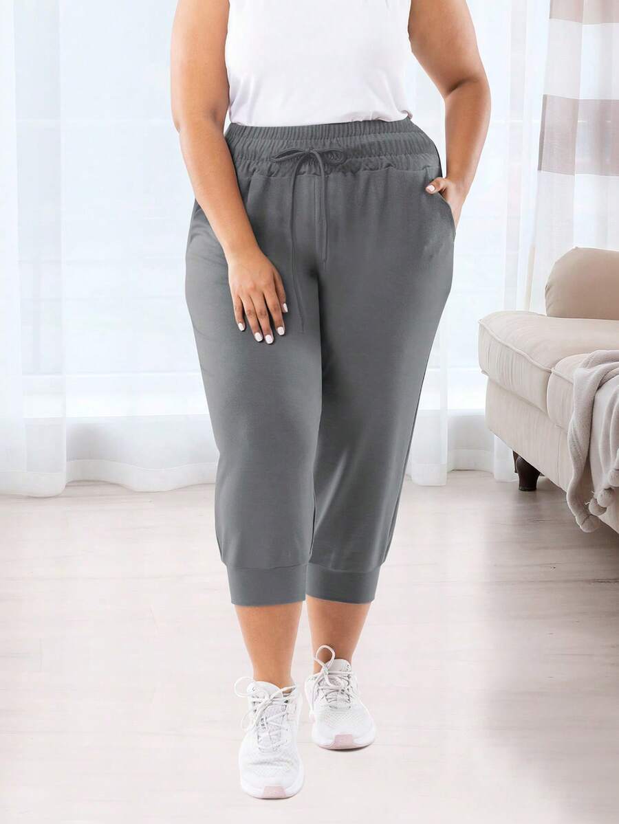 Celana Jogger Wanita Ukuran Besar dengan Kantong & Tali Serut, Gaya Olahraga Kasual, Pinggang Elastis, Potongan Longgar.