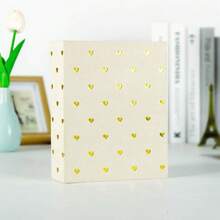 Album ảnh kích thước 6 inch, 50 trang, bìa cứng với họa tiết dập nổi vàng, kèm theo 100 album ảnh có ngăn đựng. Album này thích hợp cho kỷ niệm ngày cưới, những chuyến du lịch của bé, v.v. - Album ảnh - Xem 17