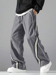 1 chiếc quần ống rộng dáng suông thời trang, có điểm nhấn là dải băng gân trang trí, thiết kế viền tương phản. Được làm từ vải polyester có độ bền cao, chống mài mòn, nhẹ và không nhăn, phù hợp cho các hoạt động ngoài trời thư giãn và thể thao thoải mái. Cạp quần co giãn giúp mặc thoải mái hơn. Một món quà đáng để thử. - Xám - Xem 10