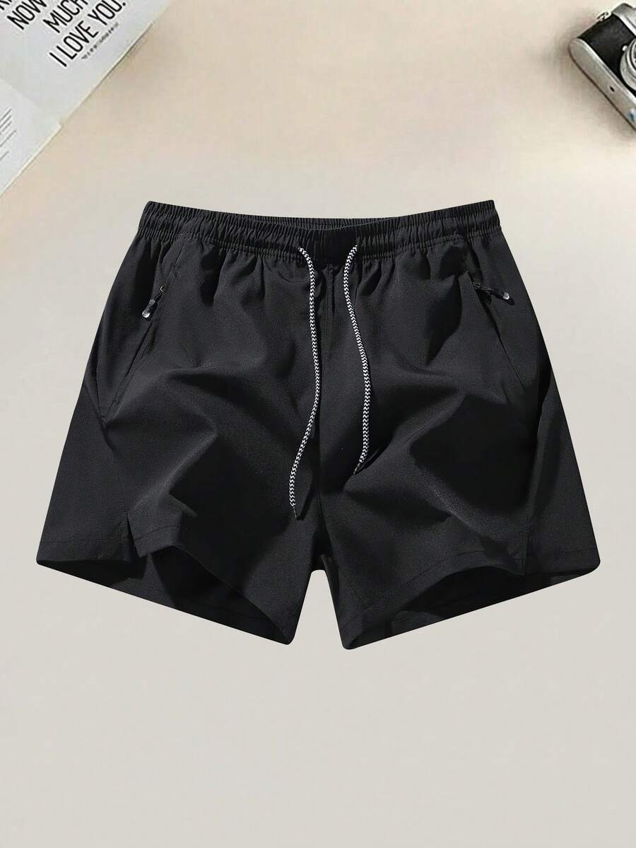 Pantalones cortos deportivos para hombres con cordón en la cintura y bolsillos laterales, adecuados para correr, baloncesto, fitness y otros deportes en color negro - Negro - Ver 1