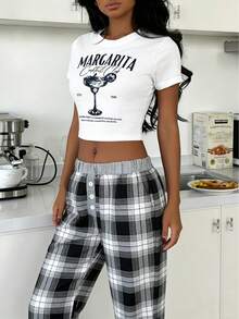 Bộ đồ ngủ 2 món dành cho nữ: Áo ngắn tay cổ tròn in họa tiết và quần ống đứng cạp chun. - trắng - Xem 6