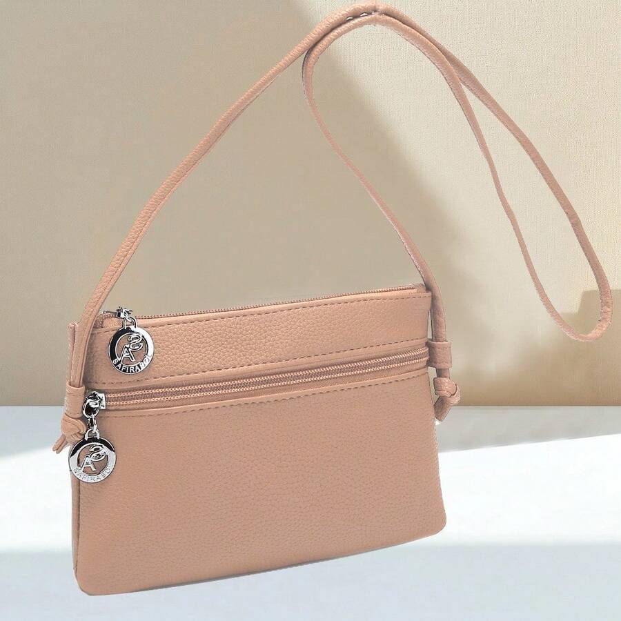 Bolsas Bolsinha Feminina Simple Transversal Cabe Celular L9026 - Rosa chiclete - Visão 1