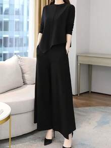 2026 Spring New Minimalist Asymmetrical Two-Piece Set – Flowy Waist-Cinching Top + Wide-Leg Trousers, Elegant Modern Luxury Women's Suit - màu đen - Xem 2