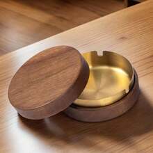 This Solid Wooden Ashtray Is Suitable For Use In Homes, Living Rooms, Dining Rooms, Bars, And Offices. It Comes With A Sealed Dust-Proof Lid That Effectively Prevents Ash From Flying Around, Keeping It Clean And Tidy. Its Circular And Minimalist Design Features A Leak-Proof Ash Prevention Mechanism. - Round - View 2