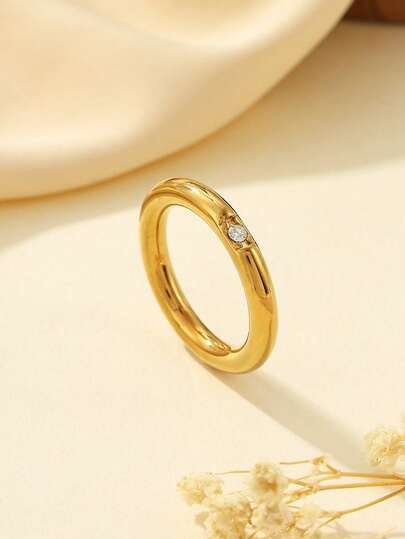 1 pieza Anillo de lujo minimalista de acero inoxidable dorado, incrustado con 1 pequeño diamante blanco, adecuado para uso diario de mujeres o como regalo