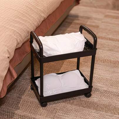 多层窄缝储物推车，带白色轮子和储物架，容量大，占地面积小，适用于桌下缝隙、厨房、浴室、卧室等场所，通用型，配有 4 个固定脚轮和可移动把手，专为整齐有序地存放书籍和杂物而设计（白色和黑色可选）