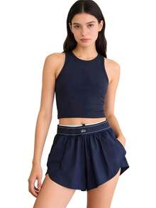 Pantalones cortos de tenis Grandstand para mujer de Alo Yoga | Tela ligera y de alto rendimiento | Corte holgado y transpirable | Pantalones deportivos cómodos de lujo para estudio y calle - Azul Marino - Ver 8