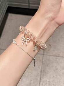 一套兼容苹果手表表带和TPU保护壳的手机挂绳表带 - 透明粉色弹力表带，配有可爱卡通蝴蝶吊坠，兼容苹果手表38、40、41、42、44、45、46毫米（SE/Ultra/1、2、3、4、5、6、7、8、9、10、11系列），清新时尚的女士智能手表配件 - 粉色 - 查看 3