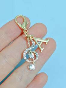 1pc Fashionable Elegant Lobster Clasp Rhinestone Music Note & Letter Shaped Keychain Pendant, Hollow Design With Embedded Rhinestones, Suitable For DIY Shoe Charms, Key Chains, Gift Packaging And Birthday/Holiday Gifts - Gold - View 14