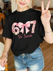 1件可愛數字青少年T恤，專為女孩設計，印有「67 (Sixty-Seven)」+蝴蝶結與花朵裝飾，柔軟舒適，適合春/夏季露營 - 黑色 - 查看 1