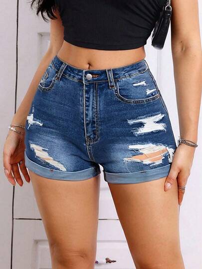 Shorts vaqueros con desgastes y borlas, con estilo único -- Interpretan el estilo de calle y destacan el encanto singular