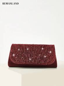 REMANLAND 这款奢华闪耀的手拿包饰有璀璨夺目的放射状水晶，散发着耀眼的光泽，造型经典永恒。它是出席正式舞会、盛大晚宴和红毯活动的完美之选，也是馈赠女性的最佳礼物。 - 酒紅色 - 查看 1