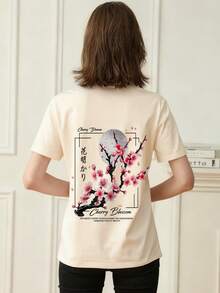 女士夏季圆领短袖T恤，樱花日式印花，宽松休闲百搭短袖上衣。适合办公室、外出、日常穿着、约会、派对、聚会、街头、嘉年华、音乐节、情人节、派对等场合。 - 杏色 - 查看 2