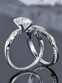 XUJIA 一套925纯银7x9毫米（2克拉）椭圆形莫桑石新娘戒指套装，经典扭纹订婚戒指，适合婚礼、周年纪念、生日派对和其他场合。 - SMO-002 - 查看 7